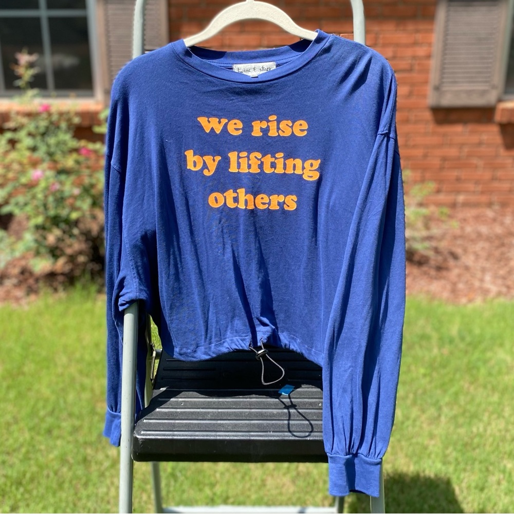 Graphic Tee - “We Rise By Lifting Others” - Size L
